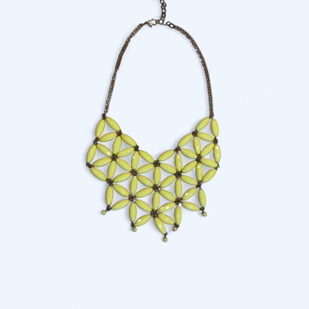 Yellow statement necklace with beads and flowers